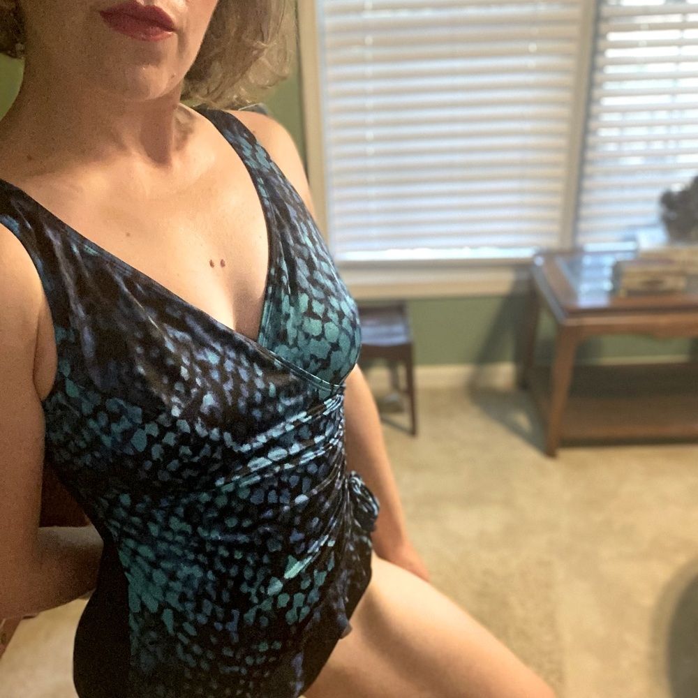 Black and blue, wrap-style one piece bathing suit